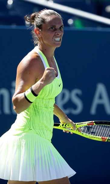 Italy's Vinci, Denmark's Wozniacki feel at home at US Open